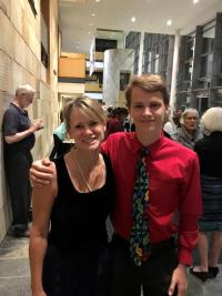 A woman with her teenage son in the lobby of the Mondavi Center